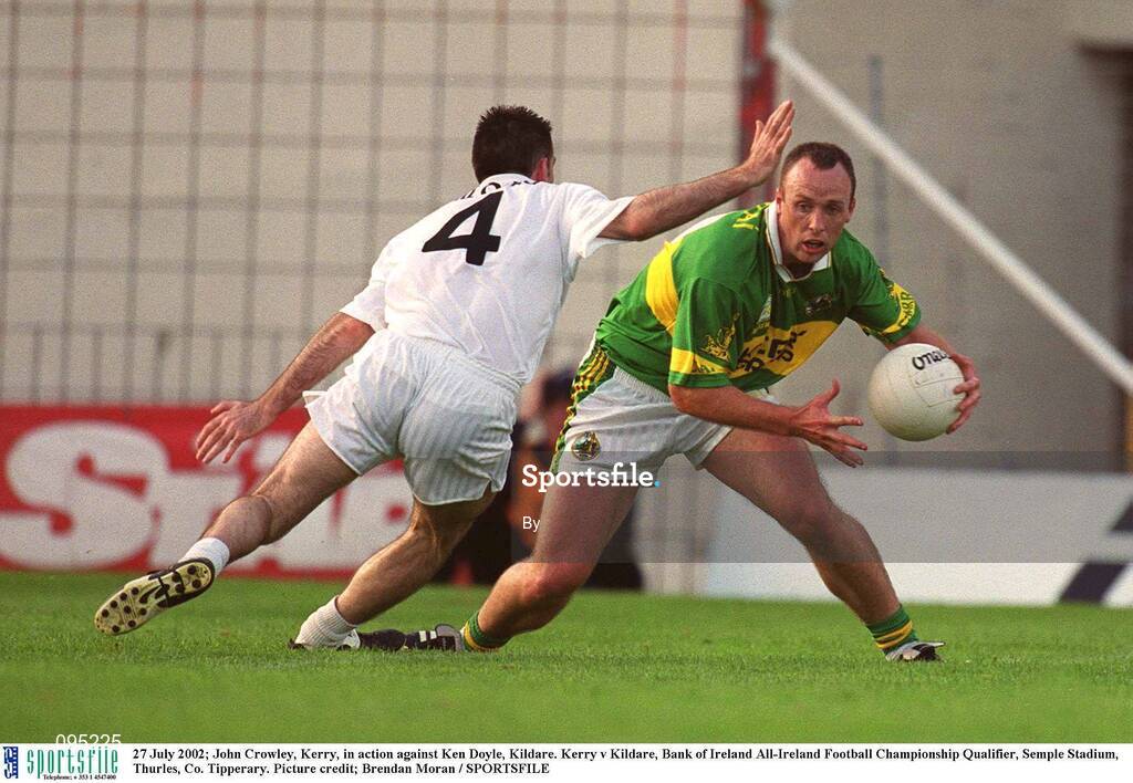 27 July 2002; John Crowley, Kerry, in action against Ken Doyle, Kildare. Kerry v Kildare, Bank of Ireland All-Ireland Football Championship Qualifier, Semple Stadium, Thurles, Co. Tipperary. Picture credit; Brendan Moran / SPORTSFILE