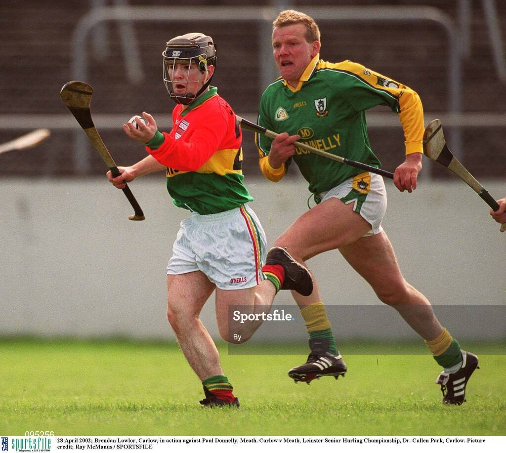 28 April 2002; Brendan Lawlor, Carlow, in action against Paul Donnelly, Meath. Carlow v Meath, Leinster Senior Hurling Championship, Dr. Cullen Park, Carlow. Picture credit; Ray McManus / SPORTSFILE