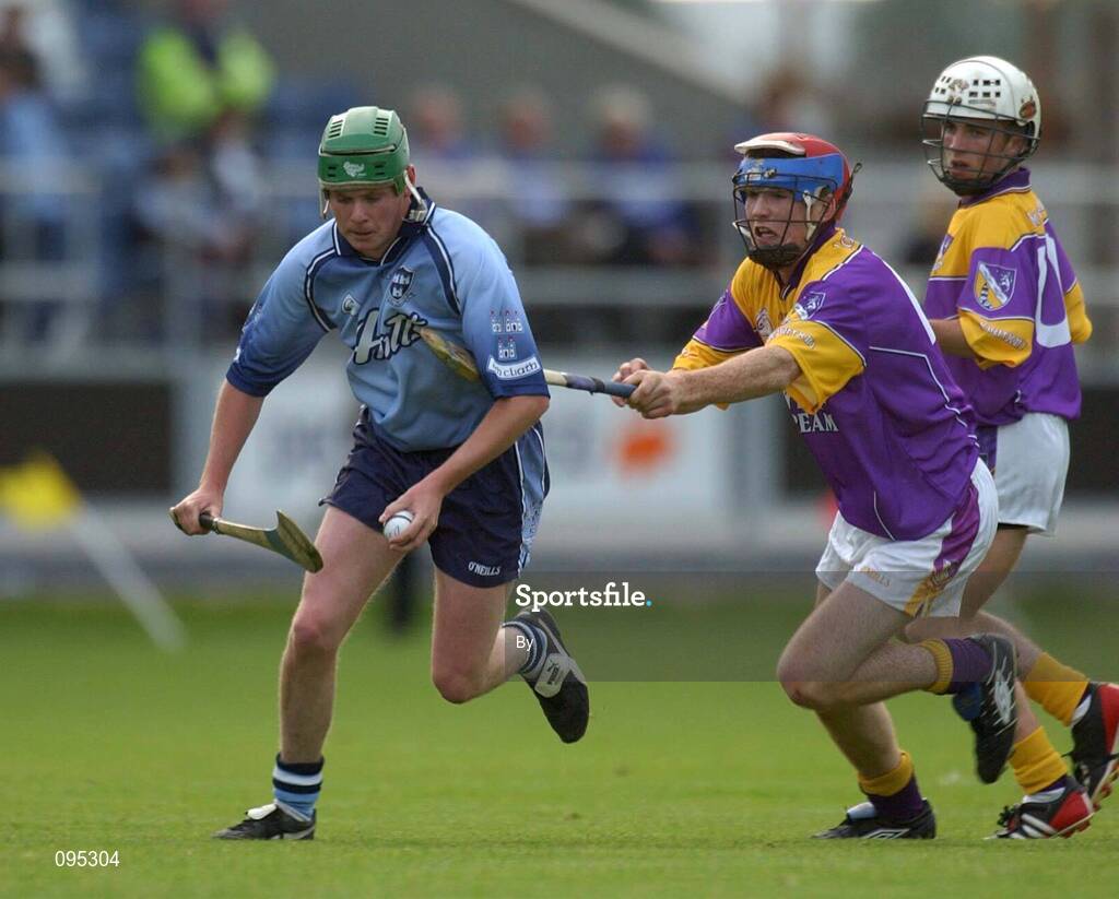 30 July 2002; Sean McCann, Dublin, in action against Diarmuid Lyng (15) and Des Mythen, Wexford. Leinster U-21 Hurling Final, Dublin v Wexford, O'Moore Park, Portlaoise, Co. Laois. Picture credit; Brendan Moran / SPORTSFILE *EDI*