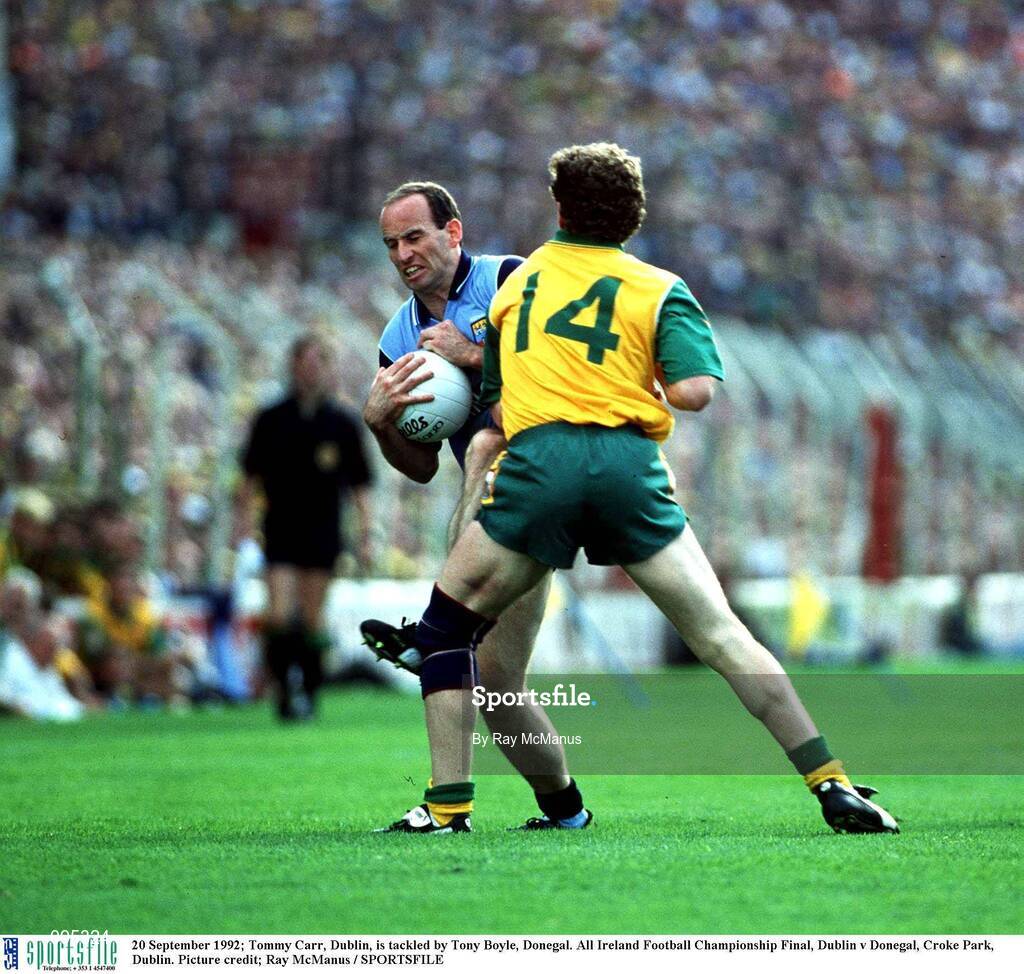 20 September 1992; Tommy Carr of Dublin is tackled by Tony Boyle of Donegal during the before the All Ireland Senior Football Championship Final match between Dublin and Donegal at Croke Park, Dublin. Photo by Ray McManus/Sportsfile