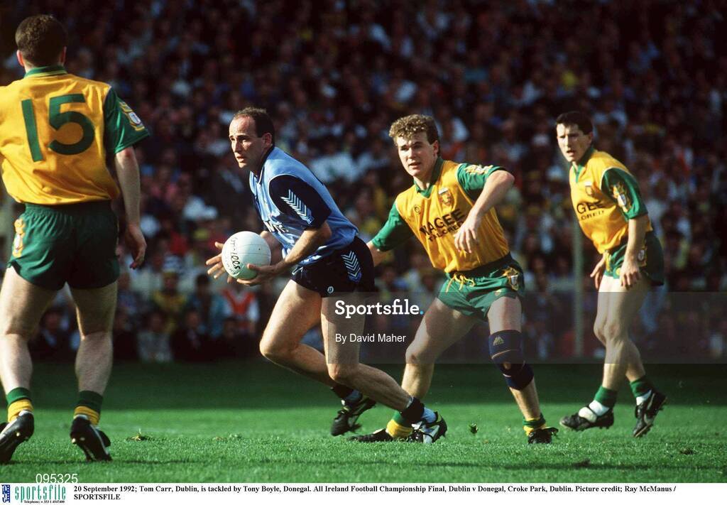 20 September 1992; Tommy Carr of Dublin is tackled by Tony Boyle of Donegal during the All Ireland Senior Football Championship Final match between Dublin and Donegal at Croke Park, Dublin. Photo by David Maher/Sportsfile