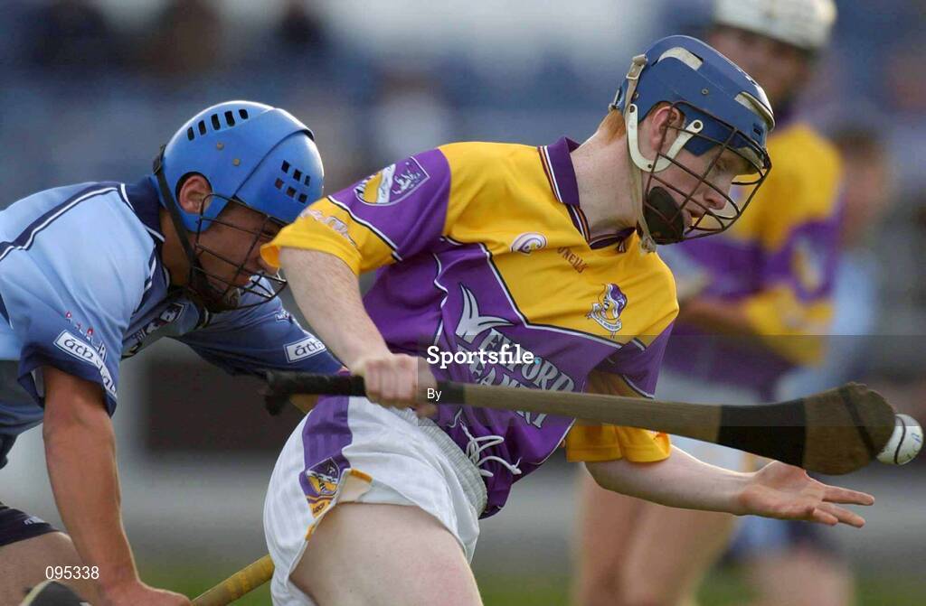 30 July 2002; Rory Jacob, Wexford, in action against Stephen Hiney, Dublin. Dublin v Wexford, Leinster U-21 Hurling Final, O'Moore Park, Portlaoise, Co. Laois. Picture credit; Brendan Moran / SPORTSFILE *EDI*