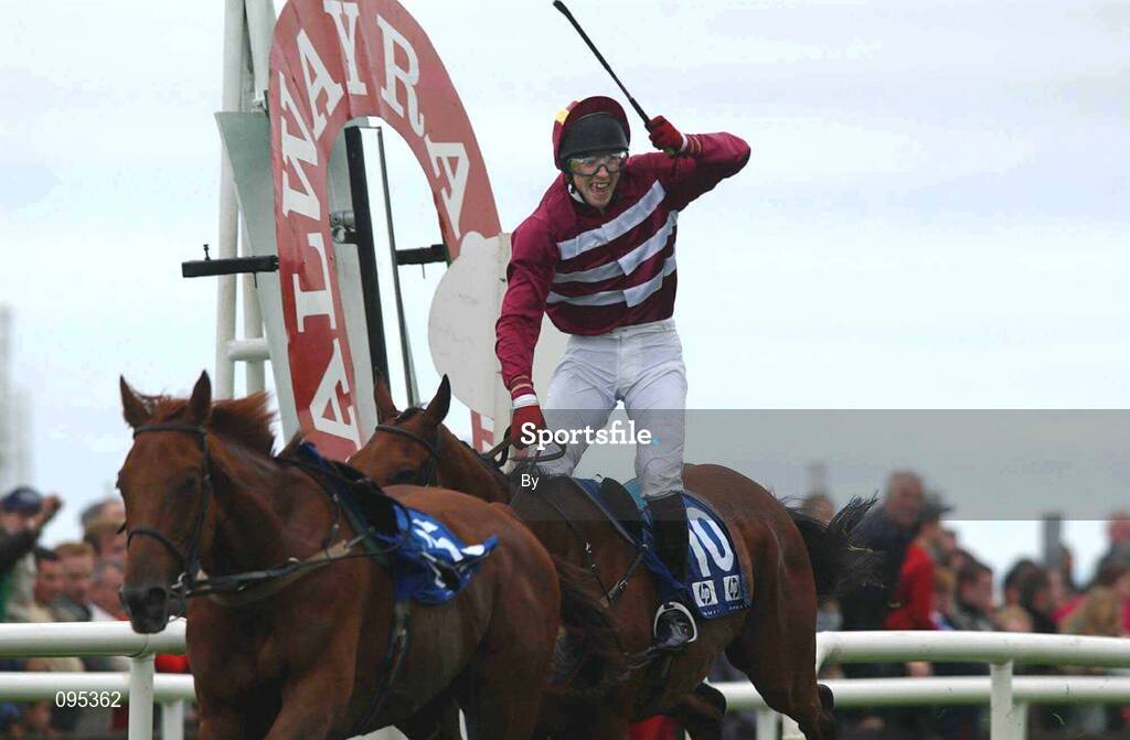 31 July 2002; Keith Hadnett, on Rockholm Boy, celebrates winning the Hewlett-Packard Galway Plate. Galway Races, Ballybrit, Co. Galway. Horse Racing. Picture credit; Matt Browne / SPORTSFILE*EDI*