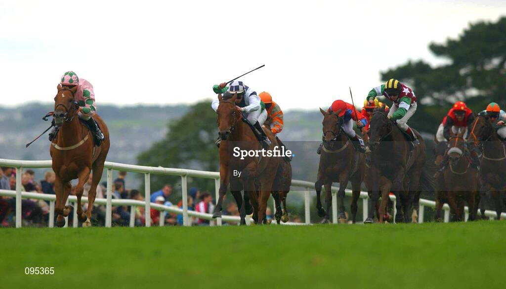 31 July 2002; Camargue with Wayne Smith, left, wins the HP Supercomputing Handicap from second placed Top Star with Tadgh O'Shea up. Galway Races, Ballybrit, Co. Galway. Horse Racing. Picture credit; Matt Browne / SPORTSFILE*EDI*