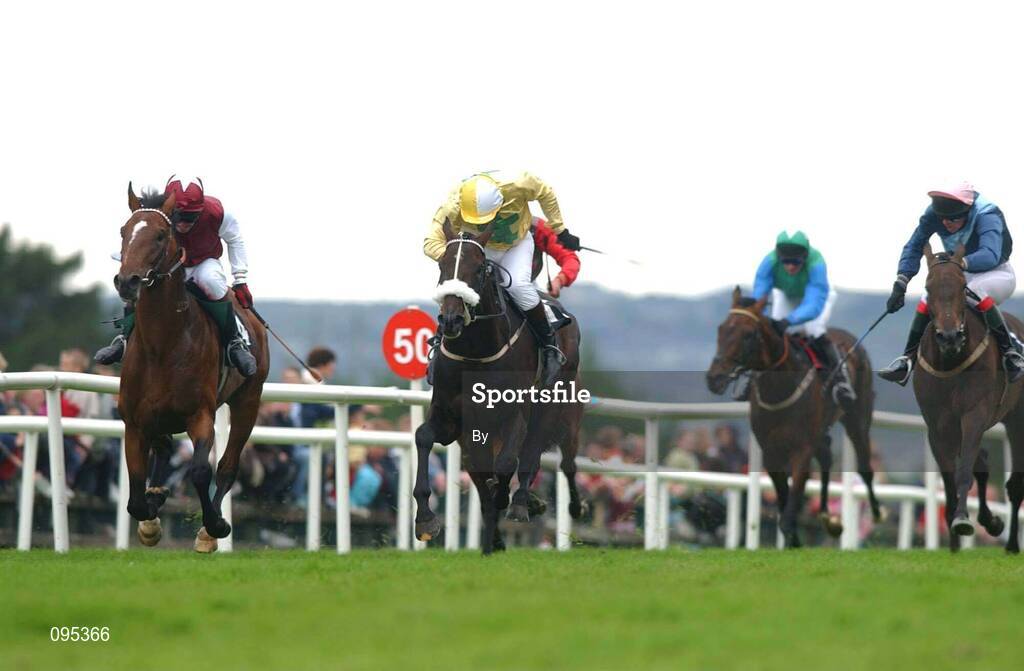 31 July 2002; Auditor with Philip Dempsey, left, wins the HP Imaging And Printing Handicap from 2nd placed Abow with Philip Fenton, centre, and 3rd placed Newtown Dancer with Ruaidhri Tierney up. Galway Races, Ballybrit, Co. Galway. Horse Racing. Picture credit; Matt Browne / SPORTSFILE*EDI*