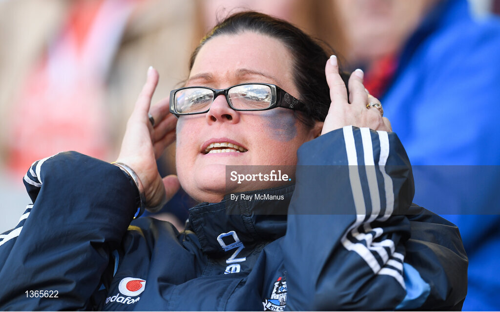 5 August 2017; A Dublin supporter, in the Cusack Stand, watches the second half of the GAA Football All-Ireland Senior Championship Quarter-Final match between Dublin and Monaghan at Croke Park in Dublin. Photo by Ray McManus/Sportsfile