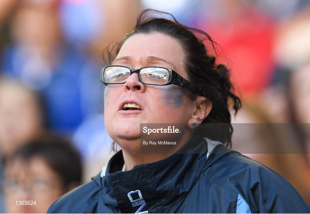 5 August 2017; A Dublin supporter, in the Cusack Stand, watches the second half of the GAA Football All-Ireland Senior Championship Quarter-Final match between Dublin and Monaghan at Croke Park in Dublin. Photo by Ray McManus/Sportsfile
