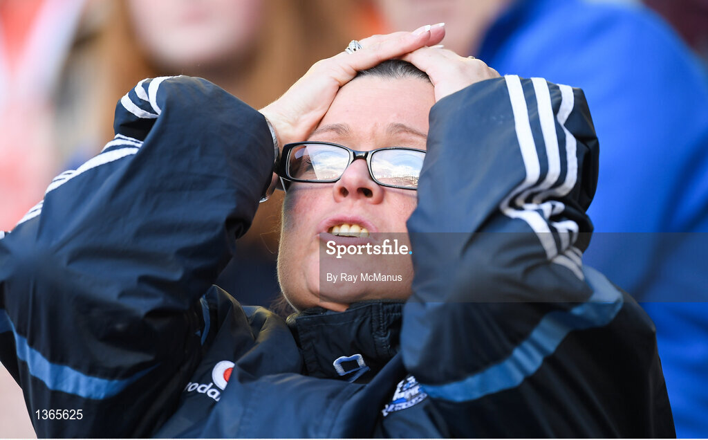 5 August 2017; A Dublin supporter, in the Cusack Stand, watches the second half of the GAA Football All-Ireland Senior Championship Quarter-Final match between Dublin and Monaghan at Croke Park in Dublin. Photo by Ray McManus/Sportsfile