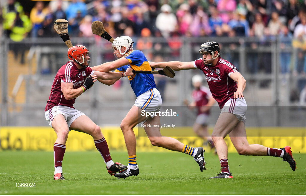 6 August 2017; John O’Dwyer of Tipperary in action against Gearoid McInerney, left, and Adrian Tuohy of Galway during the GAA Hurling All-Ireland Senior Championship Semi-Final match between Galway and Tipperary at Croke Park in Dublin. Photo by Ramsey Cardy/Sportsfile