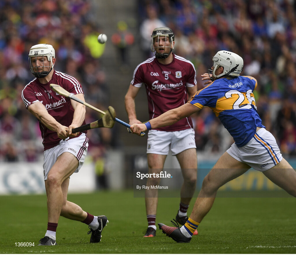 6 August 2017; Joe Canning of Galway, under pressure from Niall O'Meara of Tipperary, hits over what proved to be the winning point in the last minute of the GAA Hurling All-Ireland Senior Championship Semi-Final match between Galway and Tipperary at Croke Park in Dublin. Photo by Ray McManus/Sportsfile