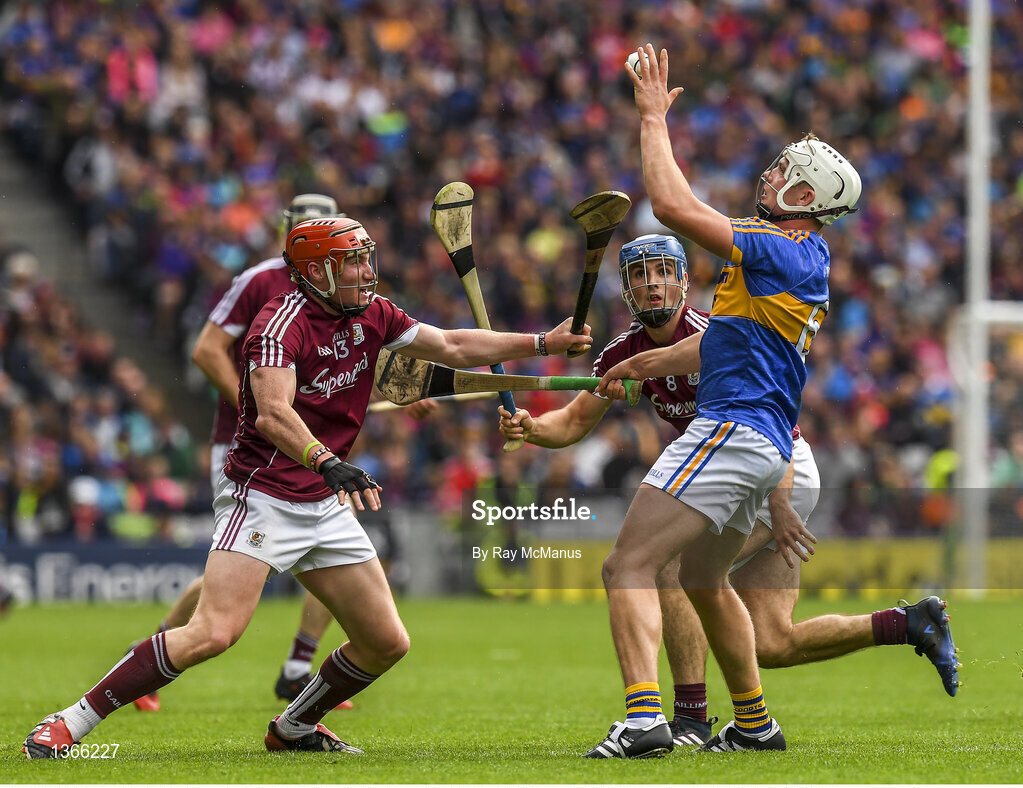6 August 2017; Ronan Maher of Tipperary hand passes under pressure from Galway players Conor Whelan, left, and Gearoid McInerney during the GAA Hurling All-Ireland Senior Championship Semi-Final match between Galway and Tipperary at Croke Park in Dublin. Photo by Ray McManus/Sportsfile