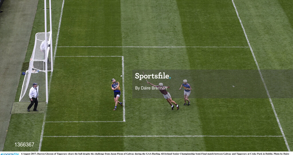6 August 2017; Darren Gleeson of Tipperary clears the ball despite the challenge from Jason Flynn of Galway during the GAA Hurling All-Ireland Senior Championship Semi-Final match between Galway and Tipperary at Croke Park in Dublin. Photo by Daire Brennan/Sportsfile