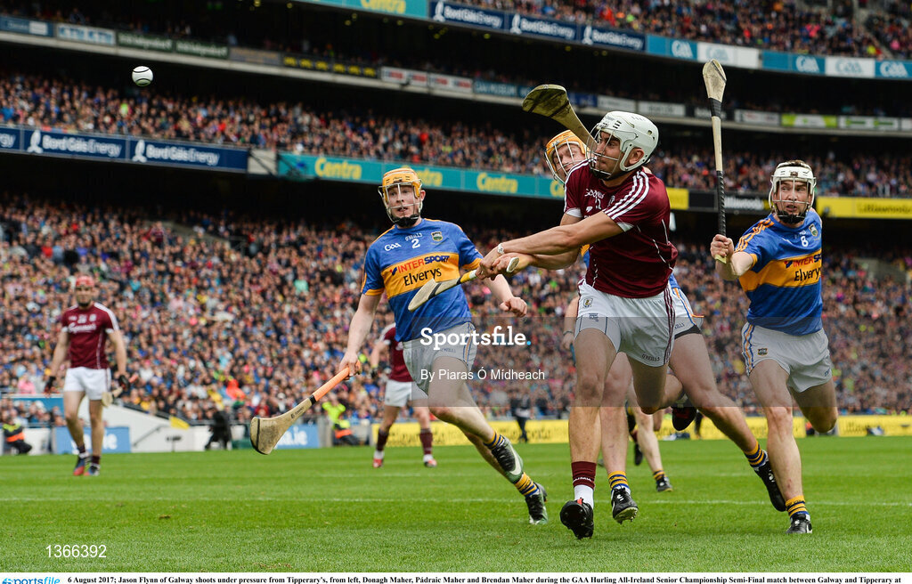 6 August 2017; Jason Flynn of Galway shoots under pressure from Tipperary's, from left, Donagh Maher, Pádraic Maher and Brendan Maher during the GAA Hurling All-Ireland Senior Championship Semi-Final match between Galway and Tipperary at Croke Park in Dublin. Photo by Piaras Ó Mídheach/Sportsfile