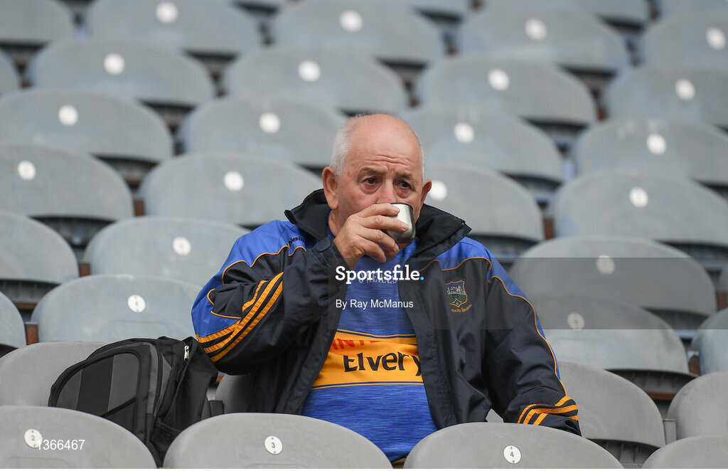 6 August 2017; A Tipperary supporter considers what might have been as he takes a drink from a flask cup after the GAA Hurling All-Ireland Senior Championship Semi-Final match between Galway and Tipperary at Croke Park in Dublin. Photo by Ray McManus/Sportsfile