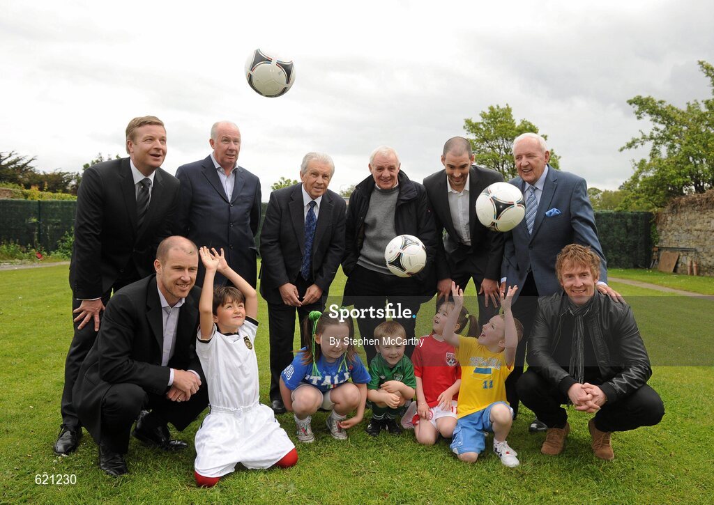 17 May 2012; RTÉ pundits and presenters, from left, Darragh Maloney, Liam Brady, John Giles, Eamon Dunphy, Richard Sadlier, Bill O'Herlihy, Kenny Cunningham, front row, left, and Hector O'hEochagain, front row, right, with children, from left, Rowan Durmis, age 6, from Citywest, Dublin, Susie Power, age 8, from Kilcullen, Co. Kildare, Callum Heath, age 4, from Tallaght, Dublin, Robyn Dempsey, age 5, from Kilcullen, Co. Kildare, and Liam Hyland, age 5, from Walkinstown, Dublin, at the launch of RTÉ’s EURO 2012 coverage. RTÉ, Donnybrook, Dublin. Picture credit: Stephen McCarthy / SPORTSFILE