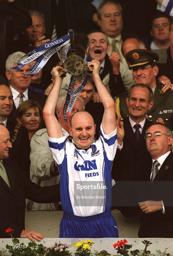 30 June 2002; Waterford captain Fergal Hartley lifts the trophy after the Guinness Munster Senior Hurling Championship Final match between Waterford and Tipperary at Páirc Uí Chaoimh in Cork. Photo by Brendan Moran/Sportsfile