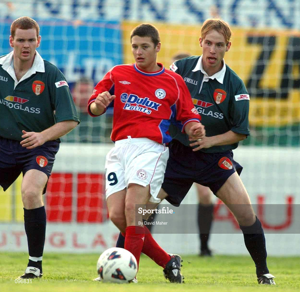 16 August 2002; Wes Hoolahan of Shelbourne in action against Colm Foley, left, and Paul Marney of St Patrick's Athletic during the eircom League Premier Division match between St Patrick's Athletic and Shelbourne at Richmond Park in Dublin. Photo by David Maher/Sportsfile