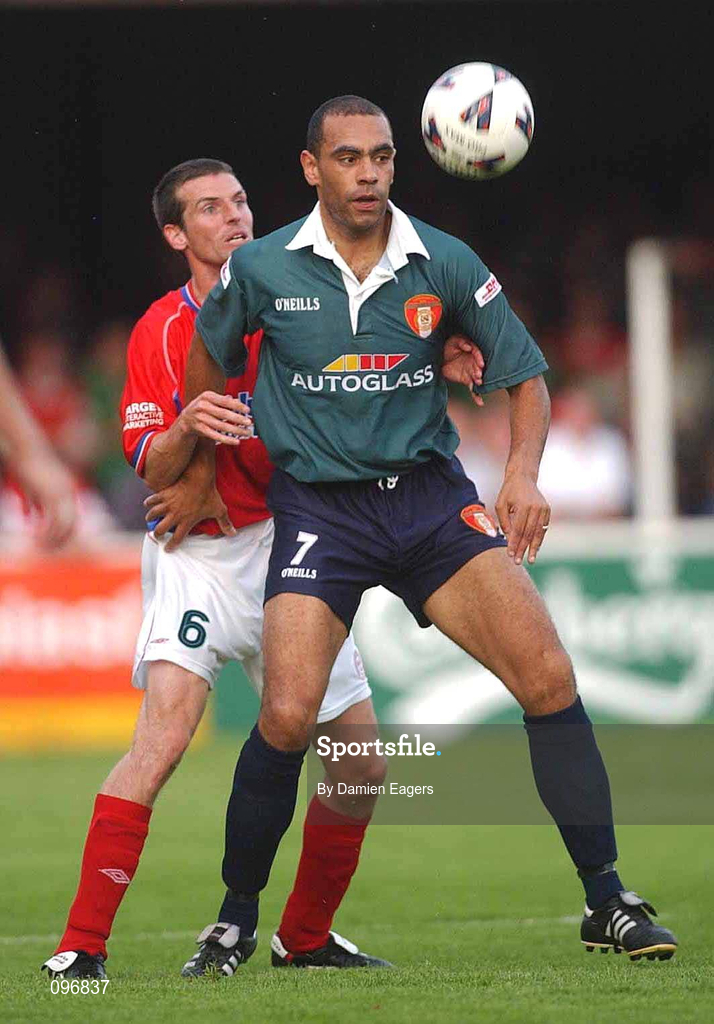 16 August 2002; Paul Osam of St Patrick's Athletic in action against Jim Crawford of Shelbourne during the eircom League Premier Division match between St Patrick's Athletic and Shelbourne at Richmond Park in Dublin. Photo by Damien Eagers/Sportsfile