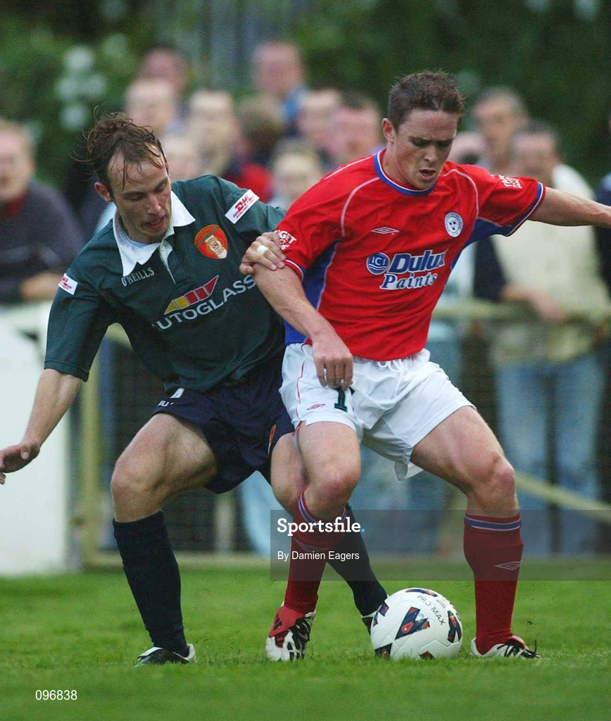 16 August 2002; Richie Baker of Shelbourne in action against Paul Marney of St Patrick's Athletic during the eircom League Premier Division match between St Patrick's Athletic and Shelbourne at Richmond Park in Dublin. Photo by Damien Eagers/Sportsfile
