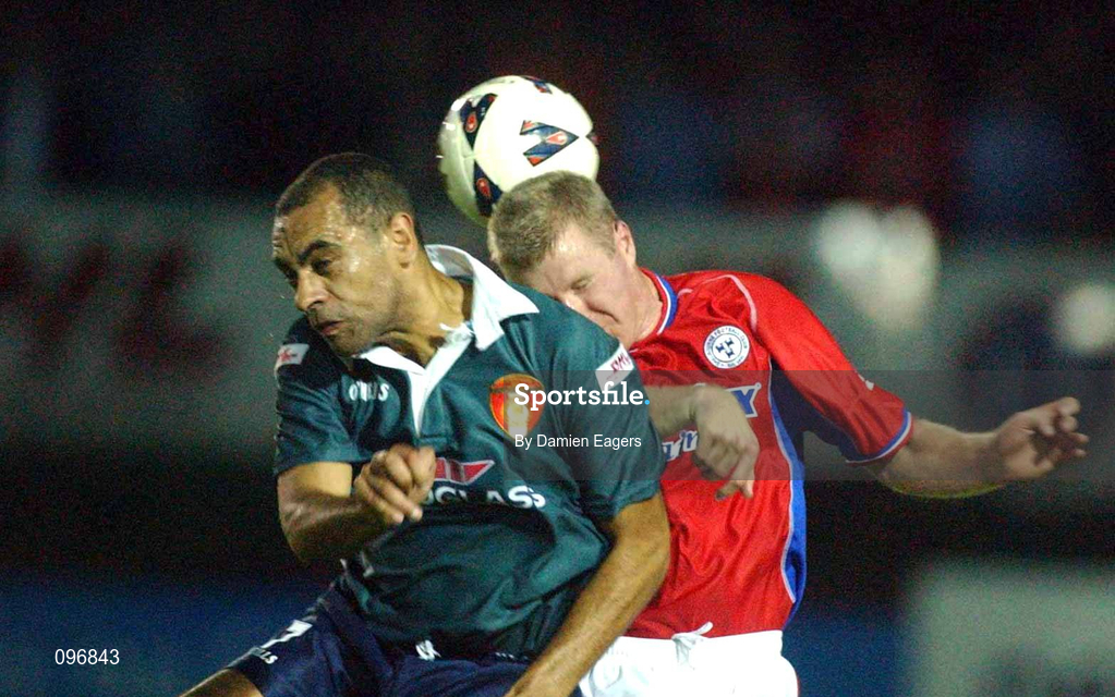 16 August 2002; Paul Osam of St Patrick's Athletic in action against Barry Prenderville of Shelbourne during the eircom League Premier Division match between St Patrick's Athletic and Shelbourne at Richmond Park in Dublin. Photo by Damien Eagers/Sportsfile