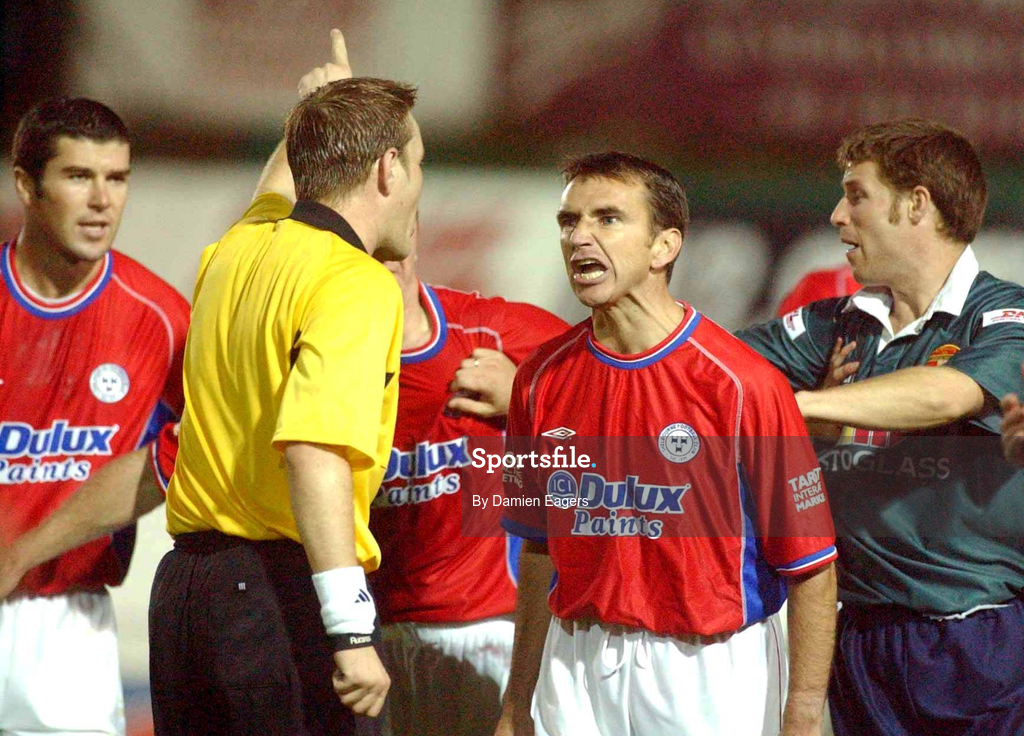 16 August 2002; Pat Fenlon, player/manager, of Shelbourne argues with referee Alan Kelly during the eircom League Premier Division match between St Patrick's Athletic and Shelbourne at Richmond Park in Dublin. Photo by Damien Eagers/Sportsfile