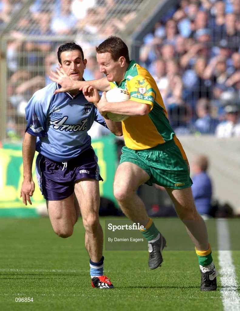 17 August 2002; Raymond Sweeney of Donegal in action against John McNally of Dublin during the Bank of Ireland All-Ireland Senior Football Championship Quarter-Final Replay match between Dublin and Donegal at Croke Park in Dublin. Photo by Damien Eagers/Sportsfile