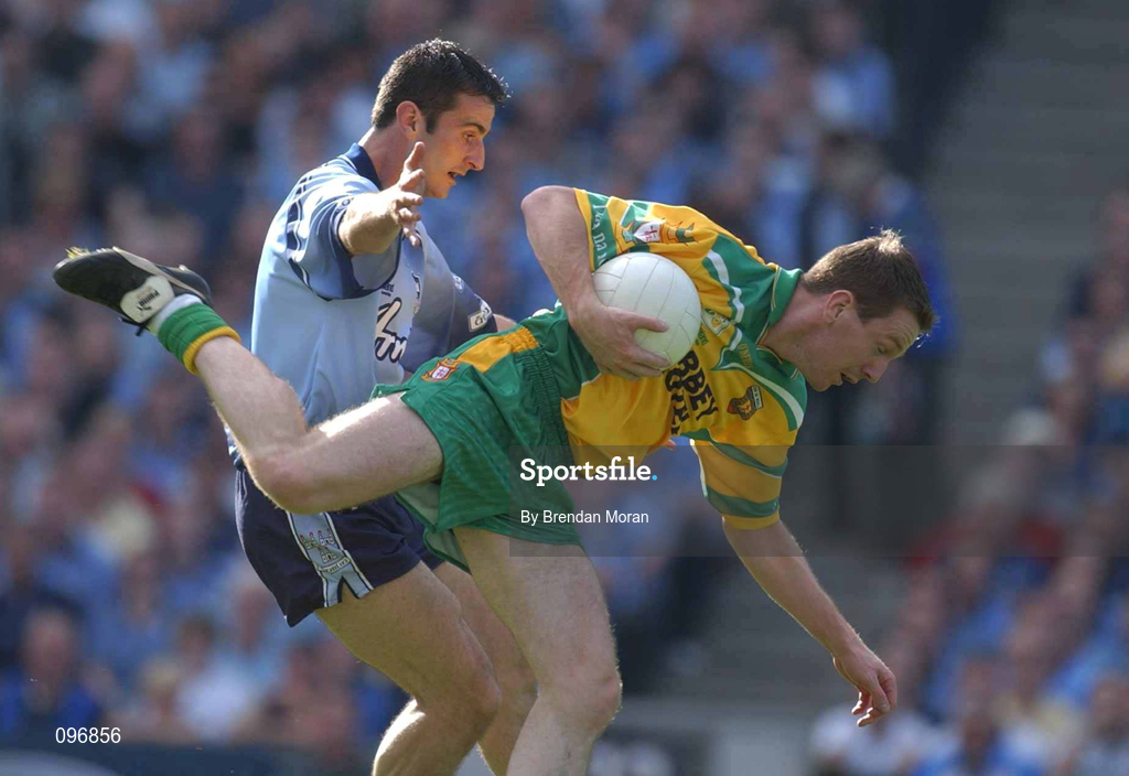 17 August 2002, Raymond Sweeney of Donegal in action against John McNally of Dublin during the Bank of Ireland All-Ireland Senior Football Championship Quarter-Final Replay match between Dublin and Donegal at Croke Park in Dublin. Photo by Brendan Moran/Sportsfile