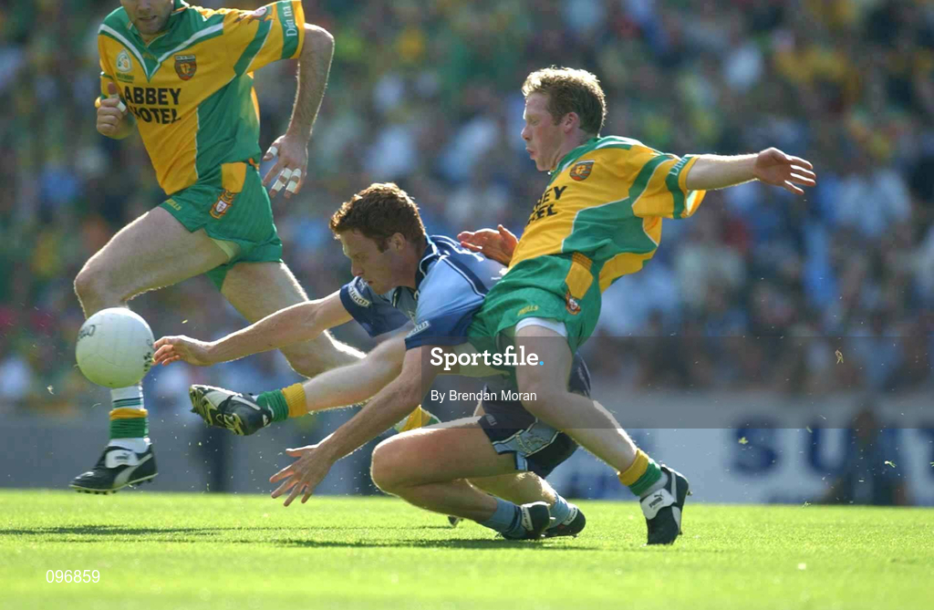17 August 2002, Brian Roper of Donegal in action against Peadar Andrews of Dublin during the Bank of Ireland All-Ireland Senior Football Championship Quarter-Final Replay match between Dublin and Donegal at Croke Park in Dublin. Photo by Brendan Moran/Sportsfile