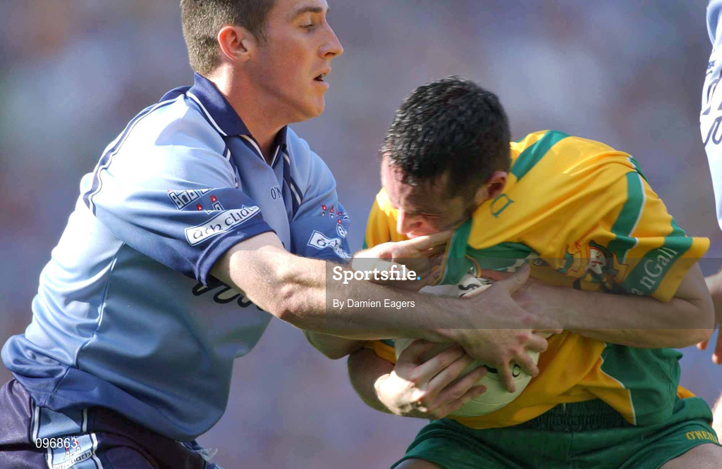 17 August 2002; Brendan Devenney of Donegal in action against Paddy Christie of Dublin during the Bank of Ireland All-Ireland Senior Football Championship Quarter-Final Replay match between Dublin and Donegal at Croke Park in Dublin. Photo by Damien Eagers/Sportsfile