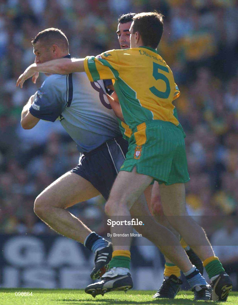 17 August 2002, Ciarán Whelan of Dublin in action against Raymond Sweeney of Donegal during the Bank of Ireland All-Ireland Senior Football Championship Quarter-Final Replay match between Dublin and Donegal at Croke Park in Dublin. Photo by Brendan Moran/Sportsfile