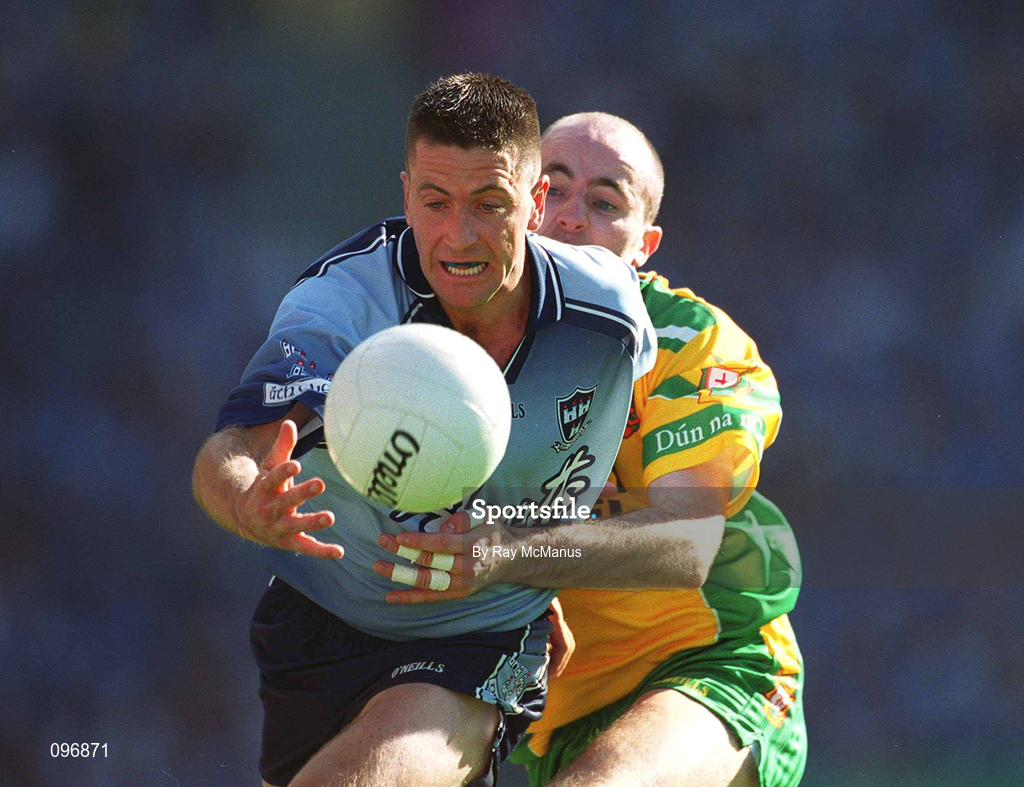 17 August 2002; Senan Connell of Dublin is tackled by Paul McGonigle of Donegal during the Bank of Ireland All-Ireland Senior Football Championship Quarter-Final Replay match between Dublin and Donegal at Croke Park in Dublin. Photo by Ray McManus/Sportsfile