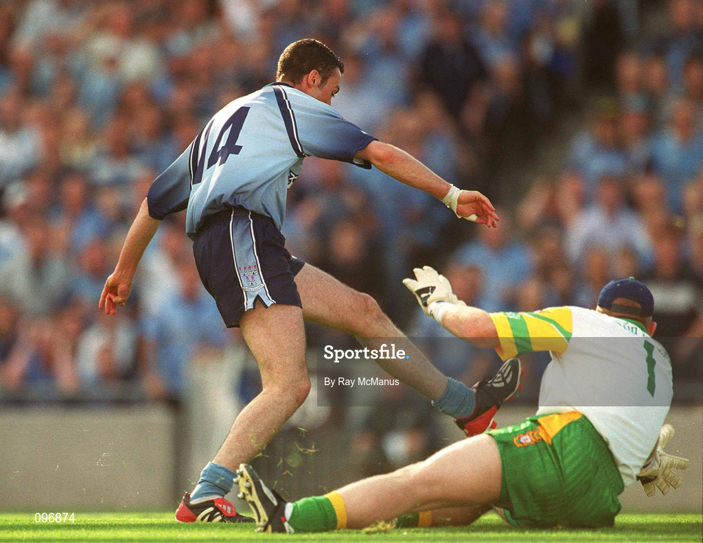 17 August 2002; Ray Cosgrove of Dublin hits the ball past Donegal goalkeeper Tony Blake to score a goal for his side during the Bank of Ireland All-Ireland Senior Football Championship Quarter-Final Replay match between Dublin and Donegal at Croke Park in Dublin. Photo by Ray McManus/Sportsfile