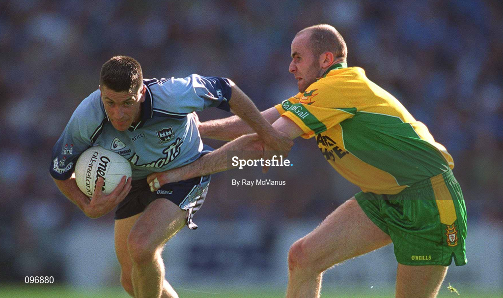 17 August 2002; Senan Connell of Dublin is tackled by Paul McGonigle of Donegal during the Bank of Ireland All-Ireland Senior Football Championship Quarter-Final Replay match between Dublin and Donegal at Croke Park in Dublin. Photo by Ray McManus/Sportsfile