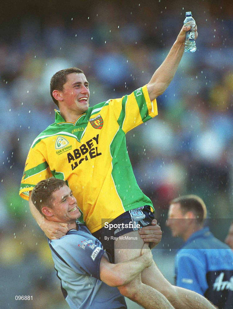 17 August 2002; Dublin's Alan Brogan is lifted by team-mate Darren Magee as they celebrate after the Bank of Ireland All-Ireland Senior Football Championship Quarter-Final Replay match between Dublin and Donegal at Croke Park in Dublin. Photo by Ray McManus/Sportsfile