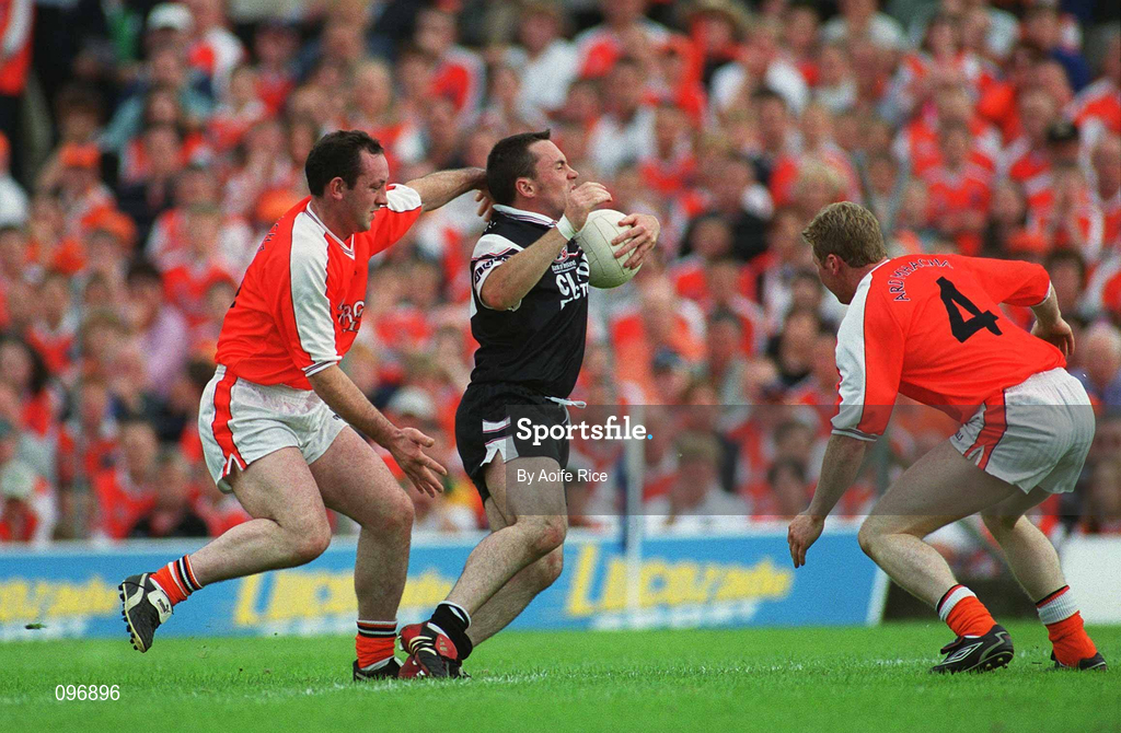 18 August 2002; Dessie Sloyan of Sligo in action against John Donaldson, left, and Francis Bellew of Armagh during the Bank of Ireland All-Ireland Senior Football Championship Quarter-Final Replay match between Armagh and Sligo at Páirc Tailteann in Navan, Meath. Photo by Aoife Rice/Sportsfile