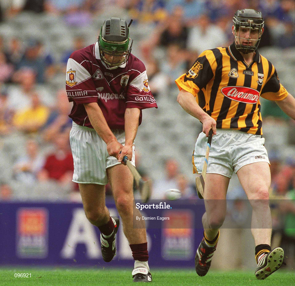 18 August 2002; Kenneth Burke of Galway shoots to score his side's second goal, as John Tennyson of Kilkenny looks on, during the All-Ireland Minor Hurling Championship Semi-Final match between Kilkenny and Galway at Croke Park in Dublin. Photo by Damien Eagers/Sportsfile