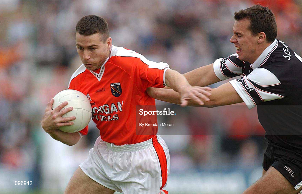 18 August 2002; Diarmuid Marsden of Armagh in action against Nigel Clancy of Sligo during the Bank of Ireland All-Ireland Senior Football Championship Quarter-Final Replay match between Armagh and Sligo at Páirc Tailteann in Navan, Meath. Photo by Brendan Moran/Sportsfile