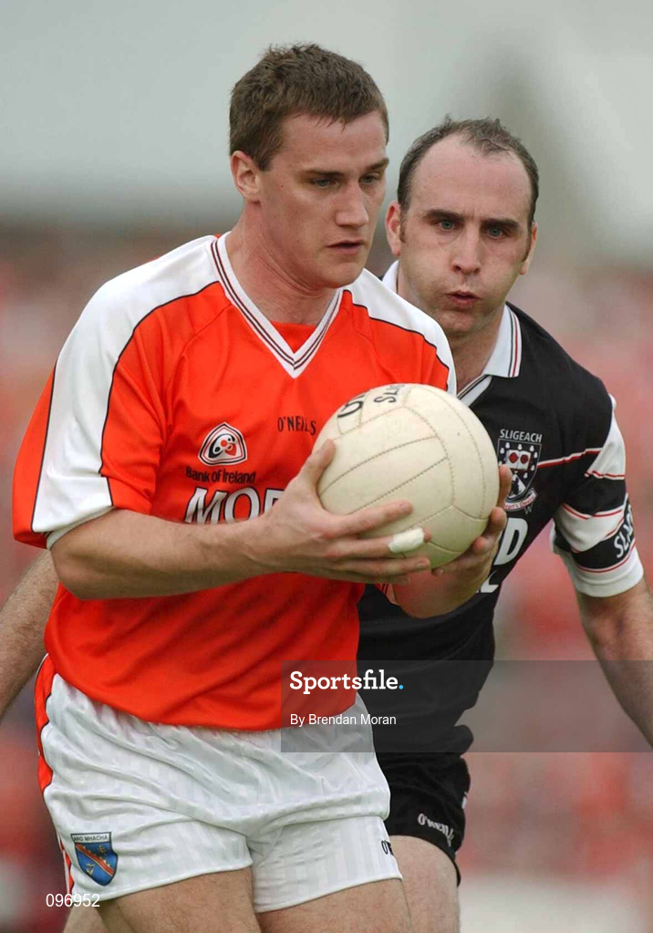 18 August 2002; John McEntee of Armagh in action against Paul Durcan of Sligo during the Bank of Ireland All-Ireland Senior Football Championship Quarter-Final Replay match between Armagh and Sligo at Páirc Tailteann in Navan, Meath. Photo by Brendan Moran/Sportsfile