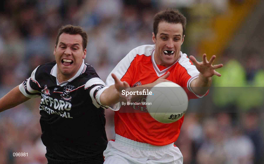 18 August 2002; Barry O'Hagan of Armagh in action against Nigel Clancy of Sligo during the Bank of Ireland All-Ireland Senior Football Championship Quarter-Final Replay match between Armagh and Sligo at Páirc Tailteann in Navan, Meath. Photo by Brendan Moran/Sportsfile