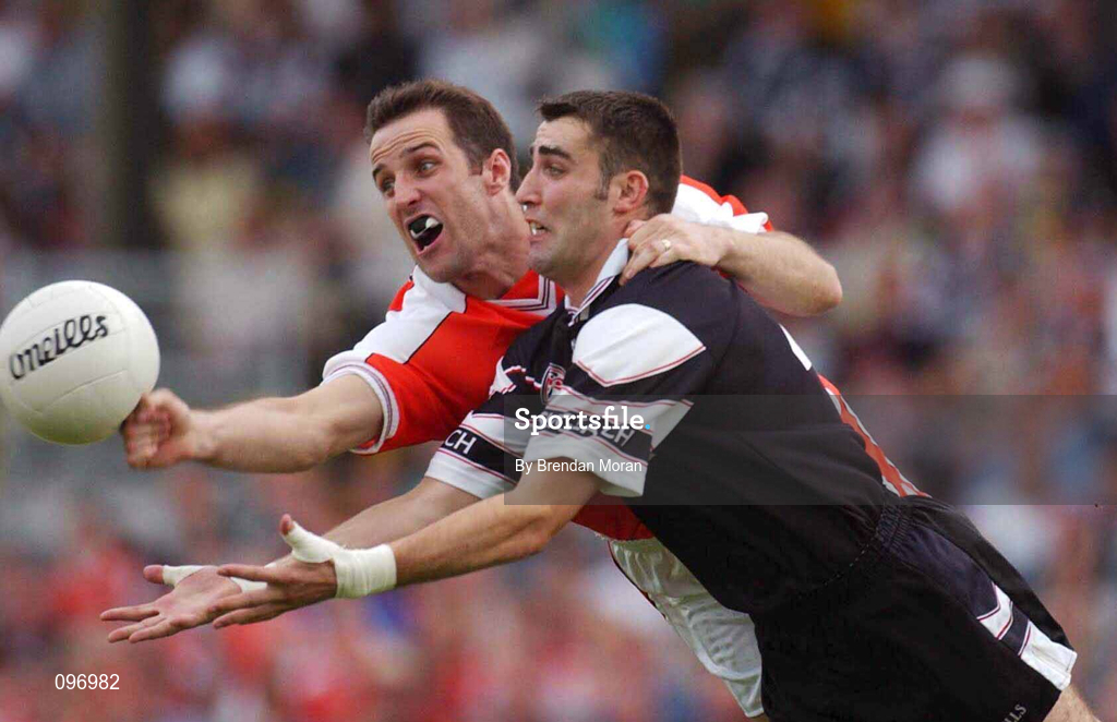 18 August 2002; Barry O'Hagan of Armagh in action against Brendan Phillips of Sligo during the Bank of Ireland All-Ireland Senior Football Championship Quarter-Final Replay match between Armagh and Sligo at Páirc Tailteann in Navan, Meath. Photo by Brendan Moran/Sportsfile
