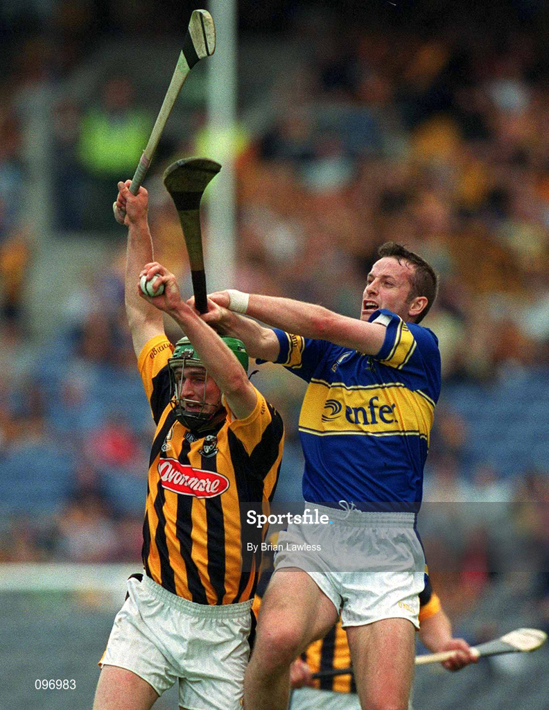 18 August 2002; Richard Mullally of Kilkenny in action against Brian O'Meara of Tipperary during the Guinness All-Ireland Senior Hurling Championship Semi-Final match between Kilkenny and Tipperary at Croke Park in Dublin. Photo by Brian Lawless/Sportsfile