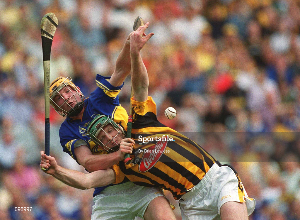 18 August 2002; Henry Shefflin of Kilkenny in action against Eamonn Corcoran of Tipperary during the Guinness All-Ireland Senior Hurling Championship Semi-Final match between Kilkenny and Tipperary at Croke Park in Dublin. Photo by Brian Lawless/Sportsfile