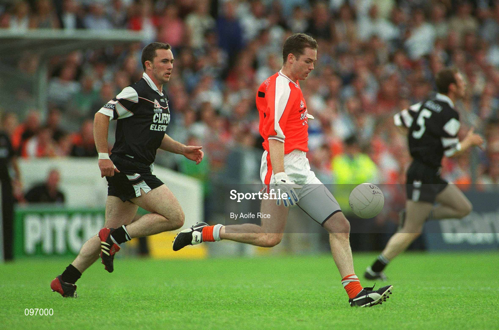 18 August 2002; Andrew McCann of Armagh in action against Dessie Sloyan of Sligo during the Bank of Ireland All-Ireland Senior Football Championship Quarter-Final Replay match between Armagh and Sligo at Páirc Tailteann in Navan, Meath. Photo by Aoife Rice/Sportsfile