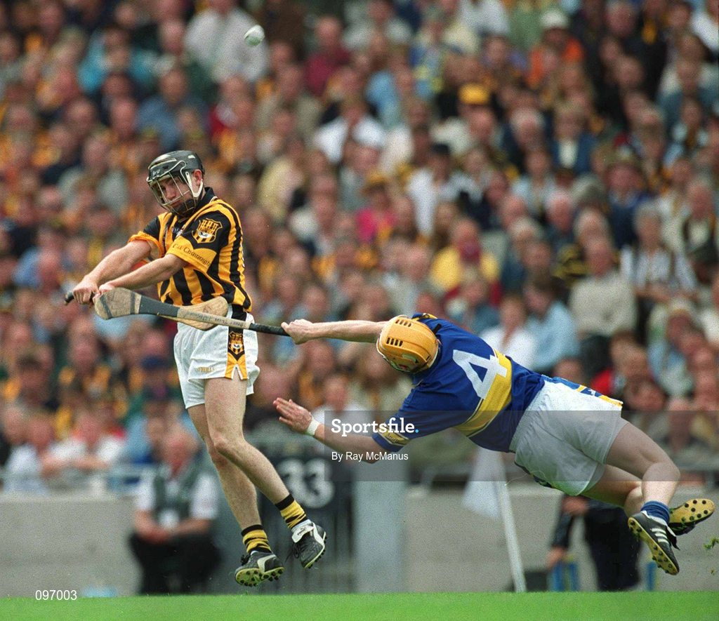 18 August 2002; Eddie Brennan of Kilkenny in action against Paul Ormonde of Tipperary during the Guinness All-Ireland Senior Hurling Championship Semi-Final match between Kilkenny and Tipperary at Croke Park in Dublin. Photo by Ray McManus/Sportsfile