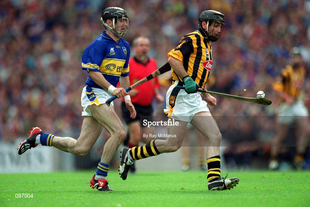18 August 2002; DJ Carey of Kilkenny in action against Thomas Costello of Tipperary during the Guinness All-Ireland Senior Hurling Championship Semi-Final match between Kilkenny and Tipperary at Croke Park in Dublin. Photo by Ray McManus/Sportsfile