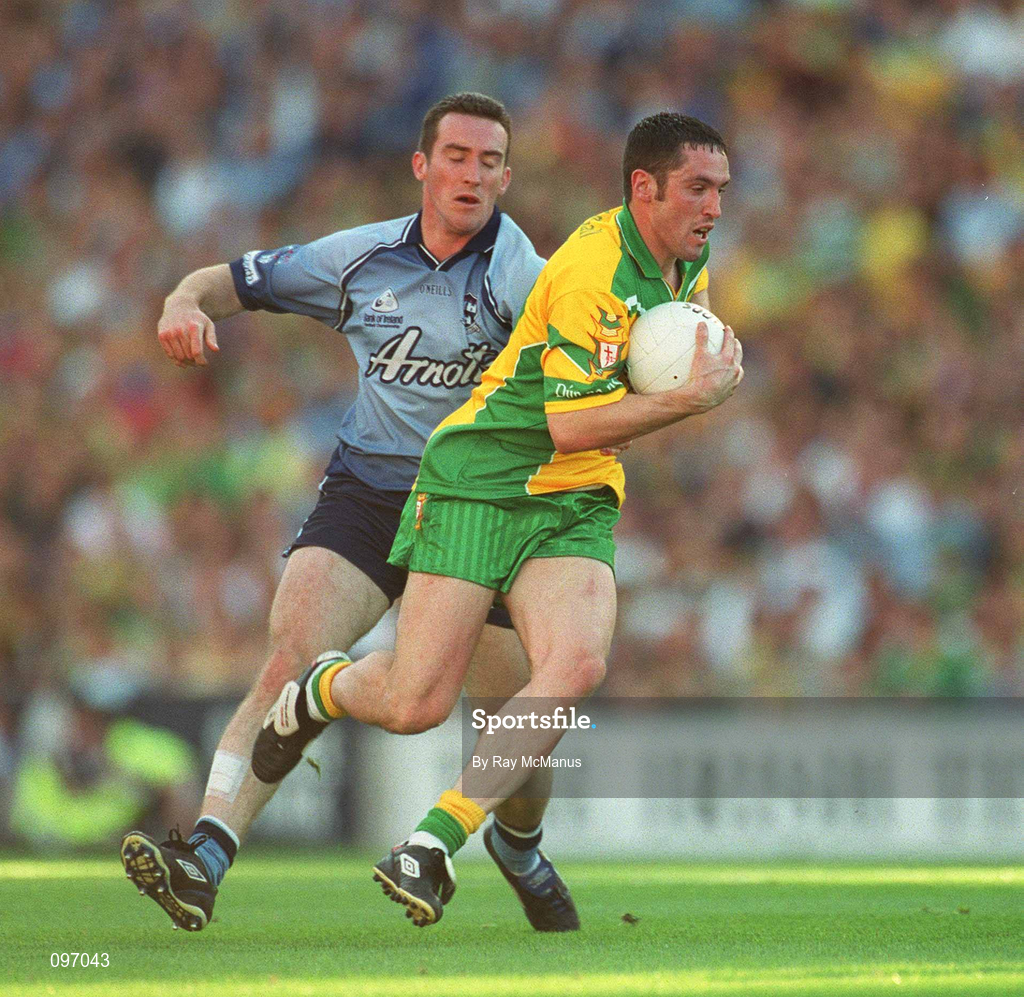 17 August 2002; Brendan Devenney of Donegal is tackled by Paddy Christie of Dublin during the Bank of Ireland All-Ireland Senior Football Championship Quarter-Final Replay match between Dublin and Donegal at Croke Park in Dublin. Photo by Ray McManus/Sportsfile