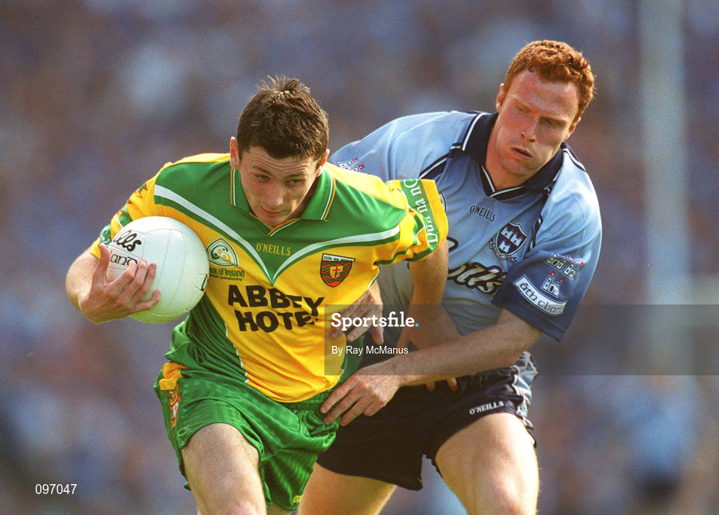 17 August 2002; Christy Toye of Donegal is tackled by Peadar Andrews of Dublin during the Bank of Ireland All-Ireland Senior Football Championship Quarter-Final Replay match between Dublin and Donegal at Croke Park in Dublin. Photo by Ray McManus/Sportsfile