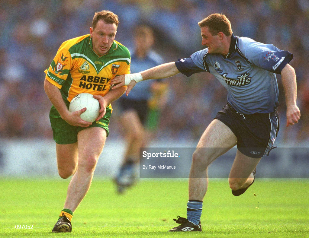 17 August 2002; Adrian Sweeney of Donegal is tackled by Coman Goggins of Dublin during the Bank of Ireland All-Ireland Senior Football Championship Quarter-Final Replay match between Dublin and Donegal at Croke Park in Dublin. Photo by Ray McManus/Sportsfile