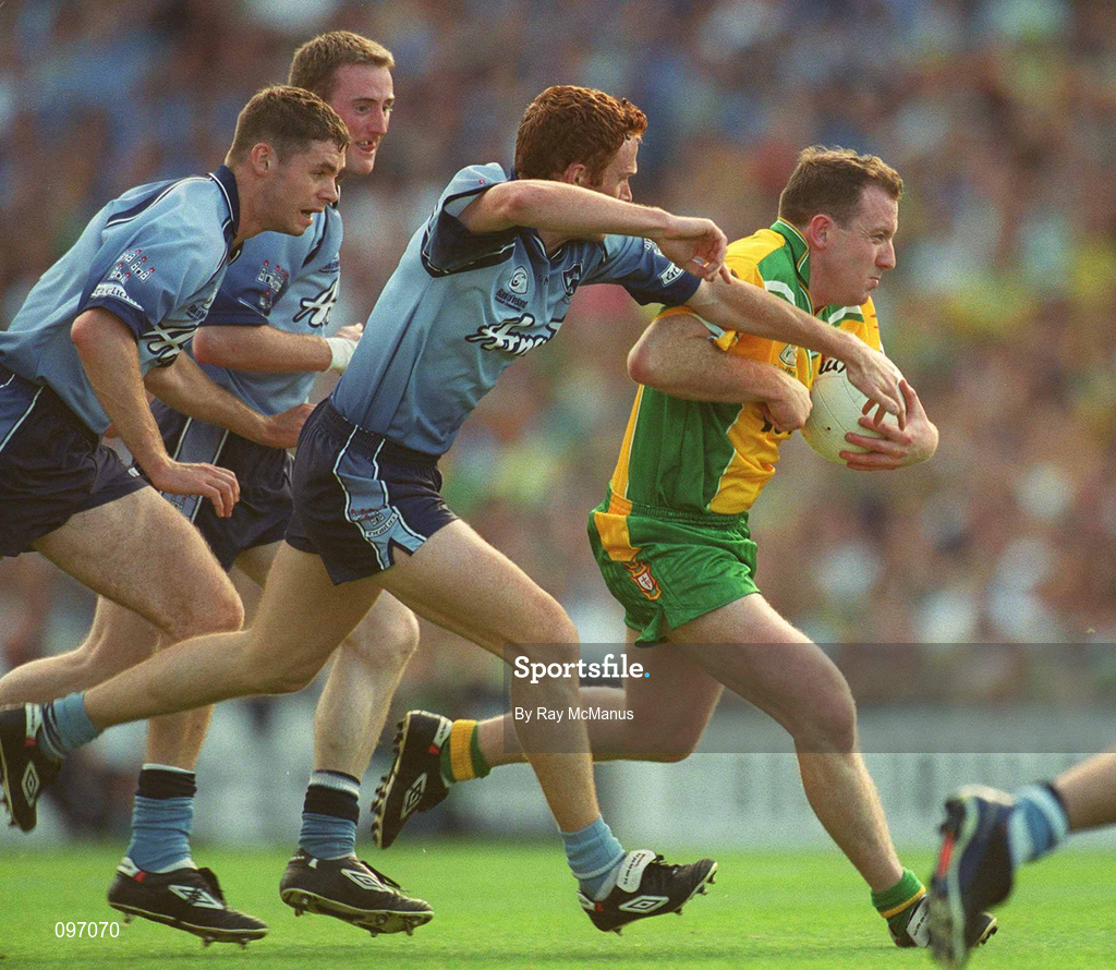 17 August 2002; Adrian Sweeney of Donegal in action against Dublin players, from left, Darren Magee, Coman Goggins and Peader Andrews during the Bank of Ireland All-Ireland Senior Football Championship Quarter-Final Replay match between Dublin and Donegal at Croke Park in Dublin. Photo by Ray McManus/Sportsfile