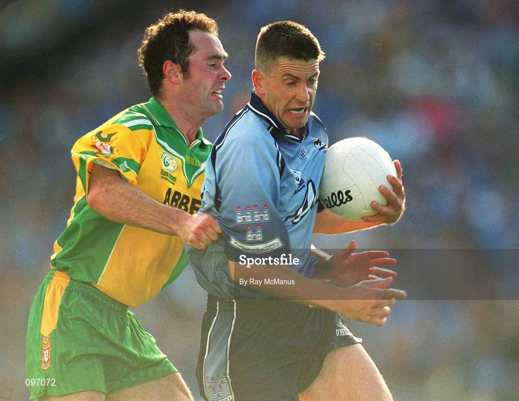 17 August 2002; Senan Connell of Dublin is tackled by Damien Diver of Donegal during the Bank of Ireland All-Ireland Senior Football Championship Quarter-Final Replay match between Dublin and Donegal at Croke Park in Dublin. Photo by Ray McManus/Sportsfile